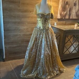 Breath Taking Gold Sequin Strapless Quinceañera Dress.